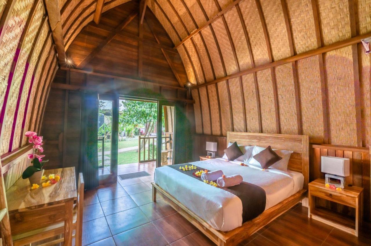 Wooden Puri Guesthouse Uluwatu Buitenkant foto