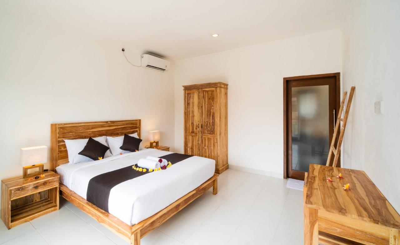 Wooden Puri Guesthouse Uluwatu Buitenkant foto