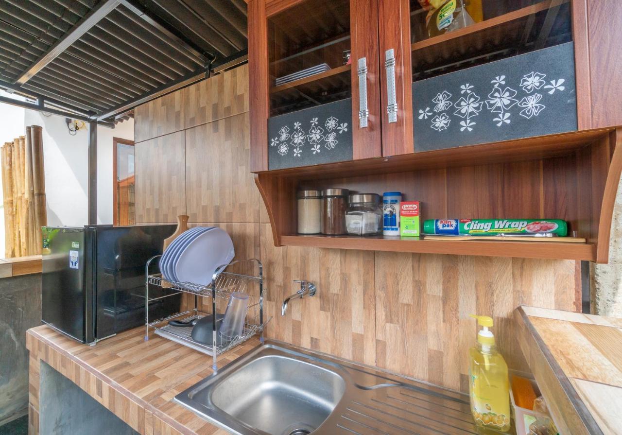 Wooden Puri Guesthouse Uluwatu Buitenkant foto