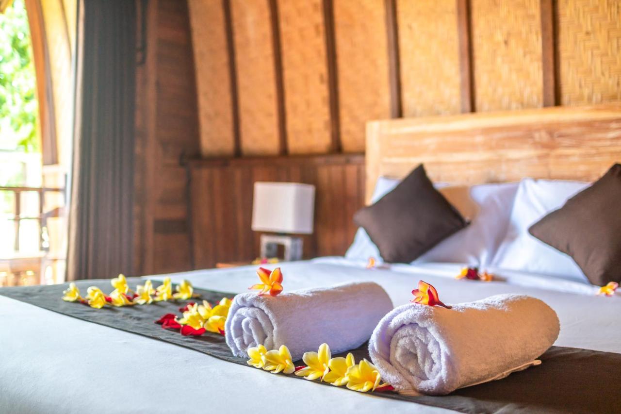 Wooden Puri Guesthouse Uluwatu Buitenkant foto