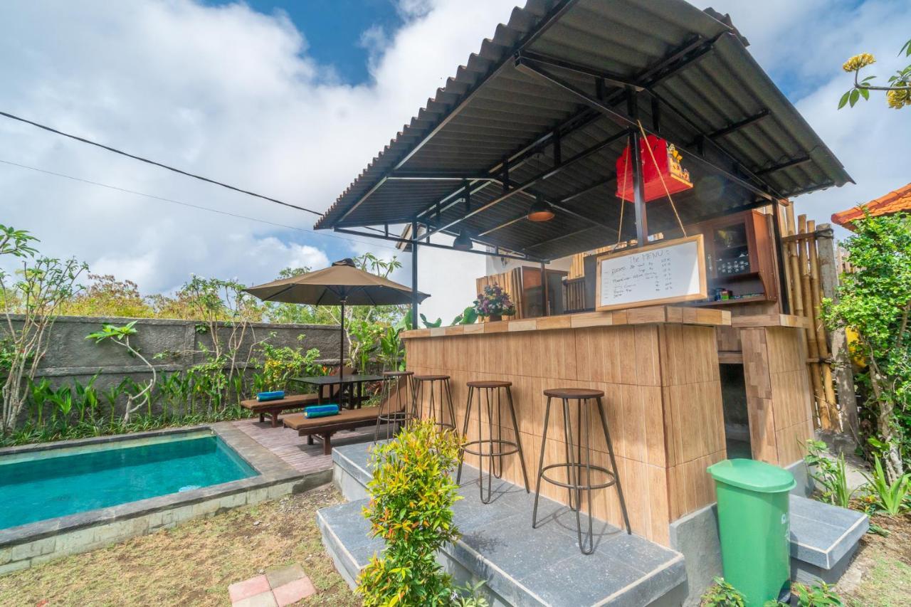 Wooden Puri Guesthouse Uluwatu Buitenkant foto