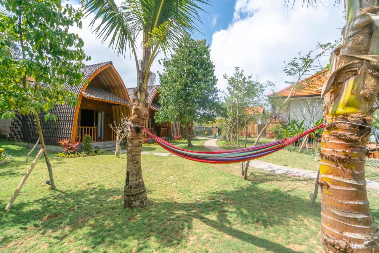 Wooden Puri Guesthouse Uluwatu Buitenkant foto