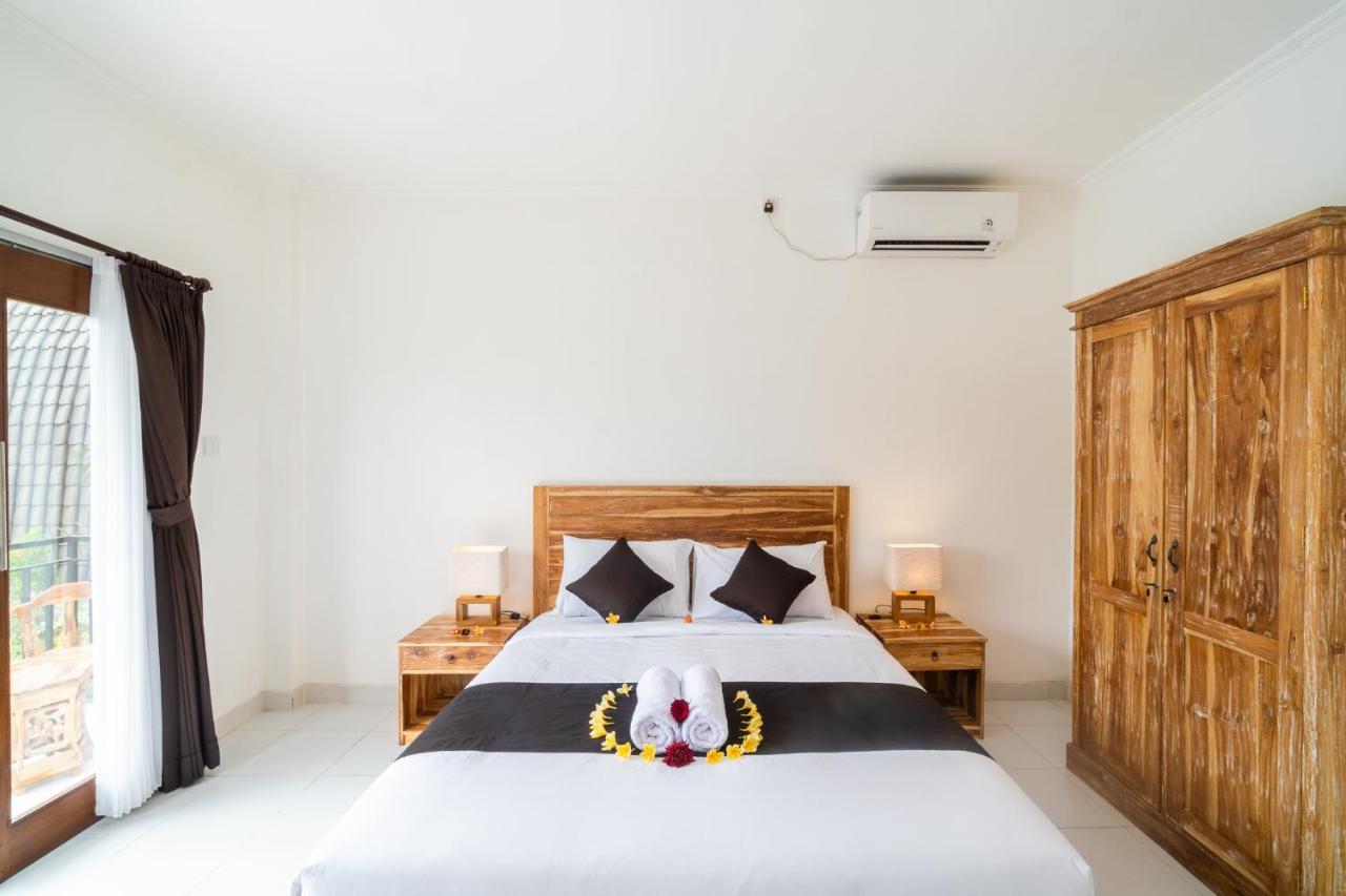 Wooden Puri Guesthouse Uluwatu Buitenkant foto